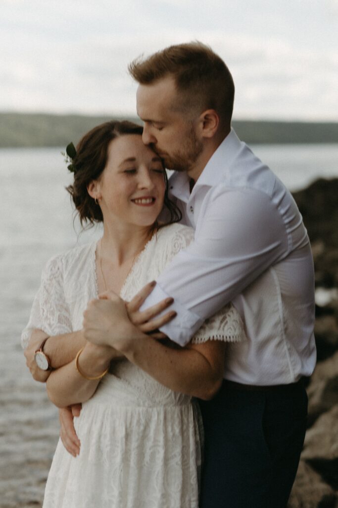 bride and groom hold each other during Newfoundland elopement