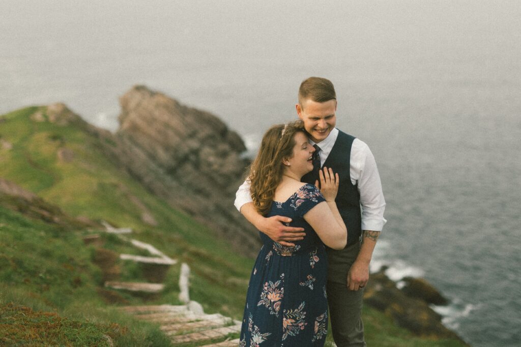 bride and groom laugh during their Newfoundland elopement