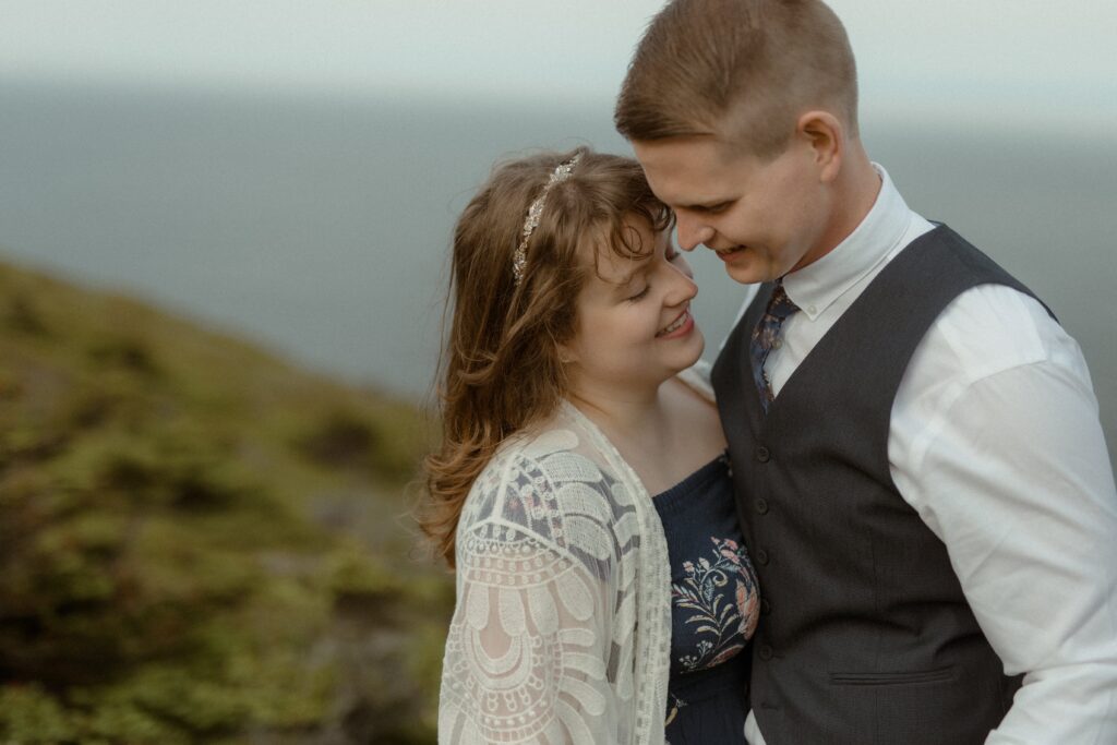 bride and groom hold each other during Newfoundland elopement