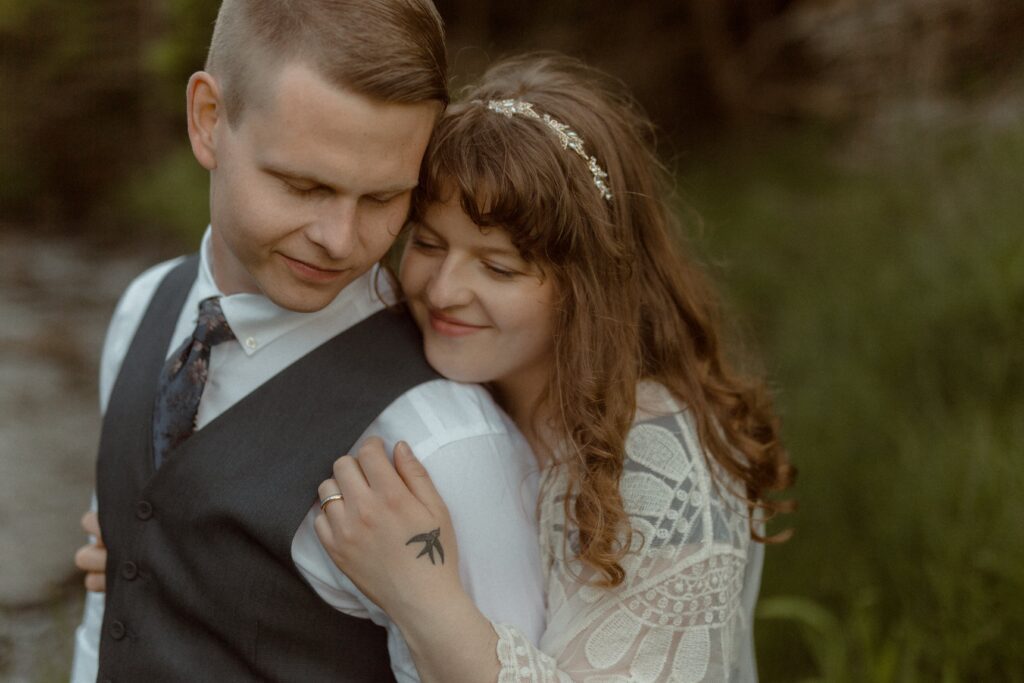 bride and groom hold each other during Newfoundland elopement