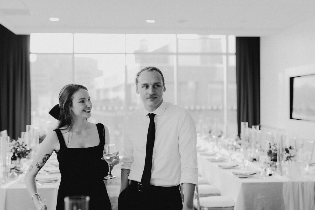candid photo of laughing wedding guests at the Alt Hotel in St. John's
