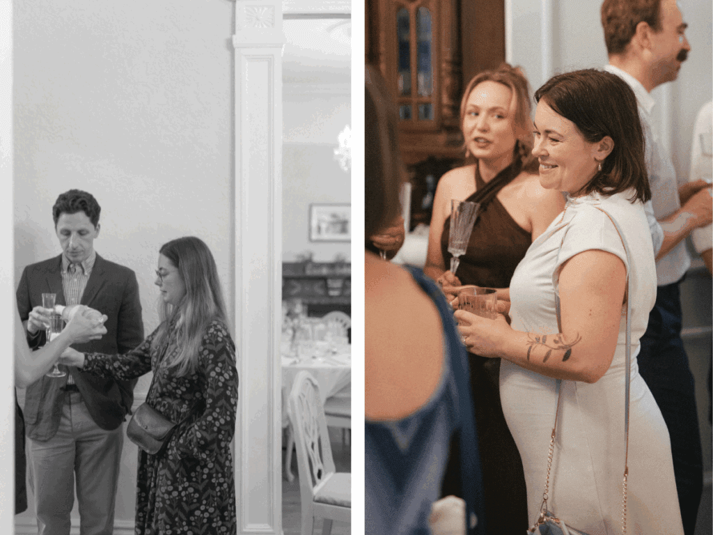candid photo of bride smiling at her guests in a victorian home