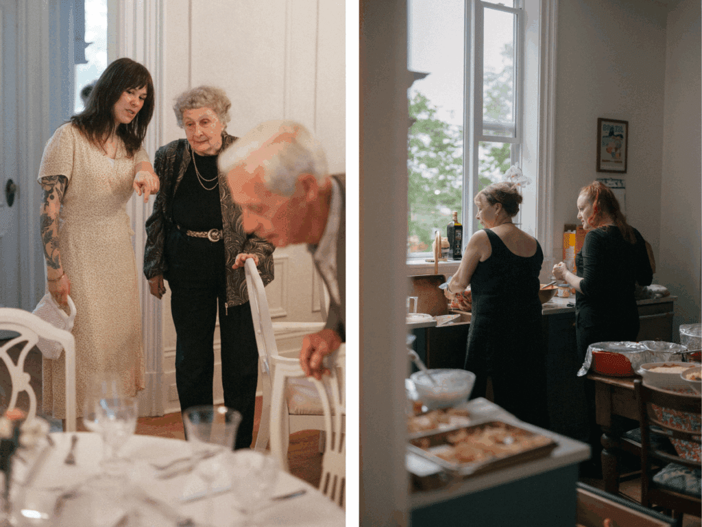 candid photo of wedding guest pointing out place setting to grandparents