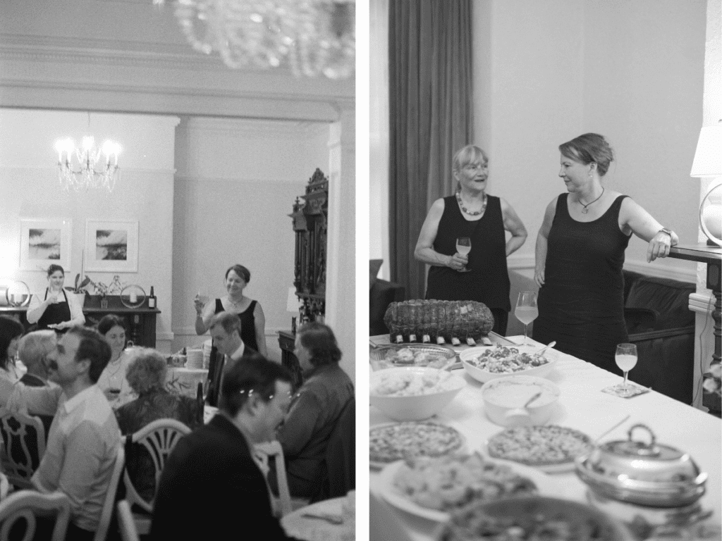 candid photo of a toast to the bride and groom in a victorian dining room