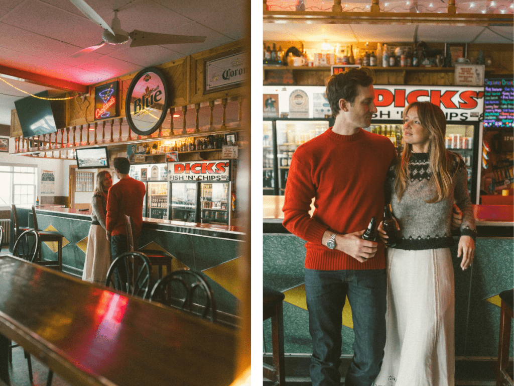 couple drink beer at a dive bar