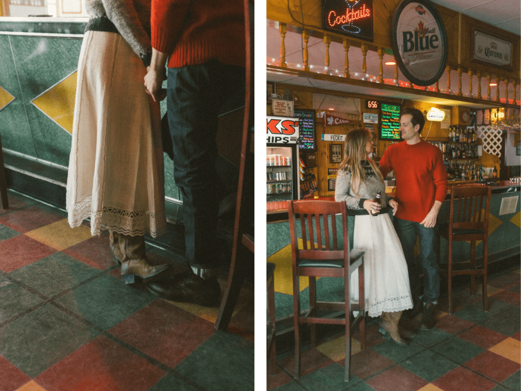 couple drink beer at dive bar