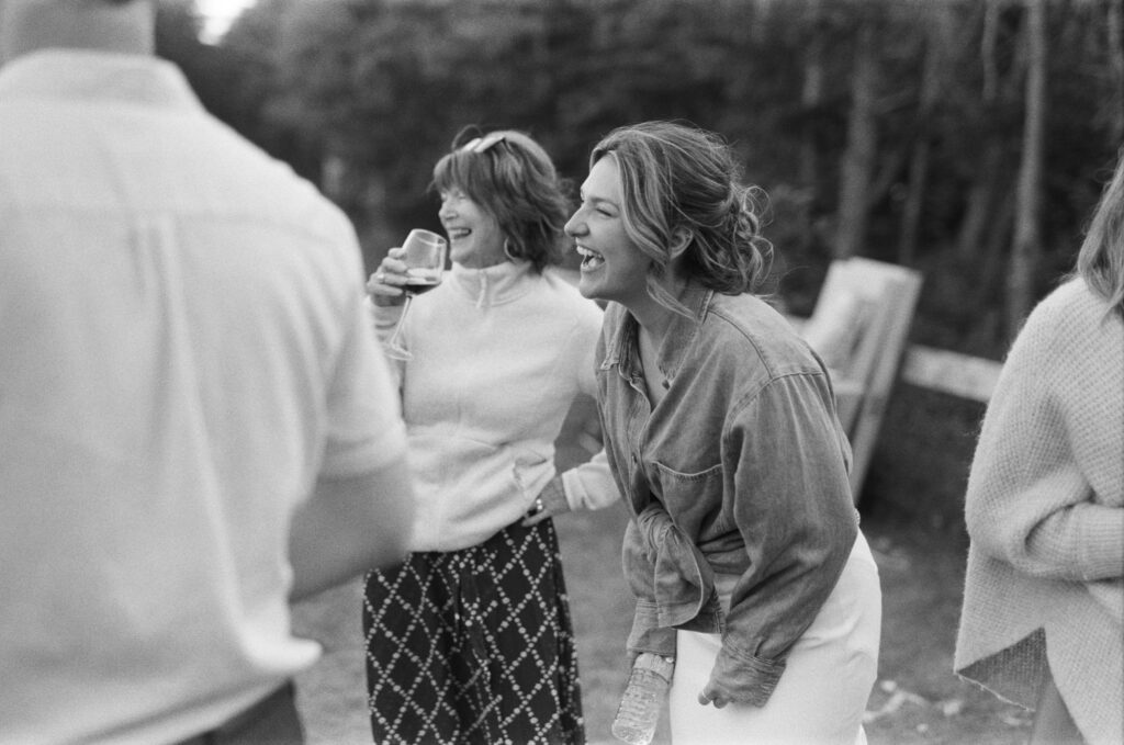 bride and her grandmother laugh at campground wedding