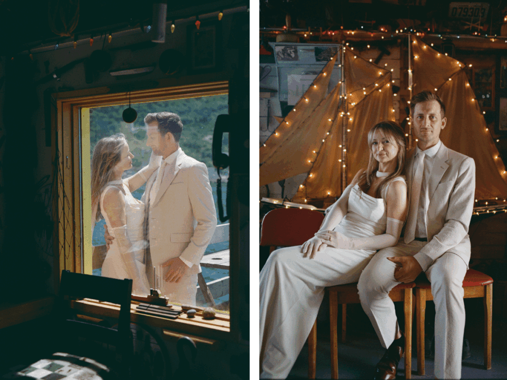 35 mm film photo of bride and groom seated beside a large model boat in a fishing shack in Newfoundland