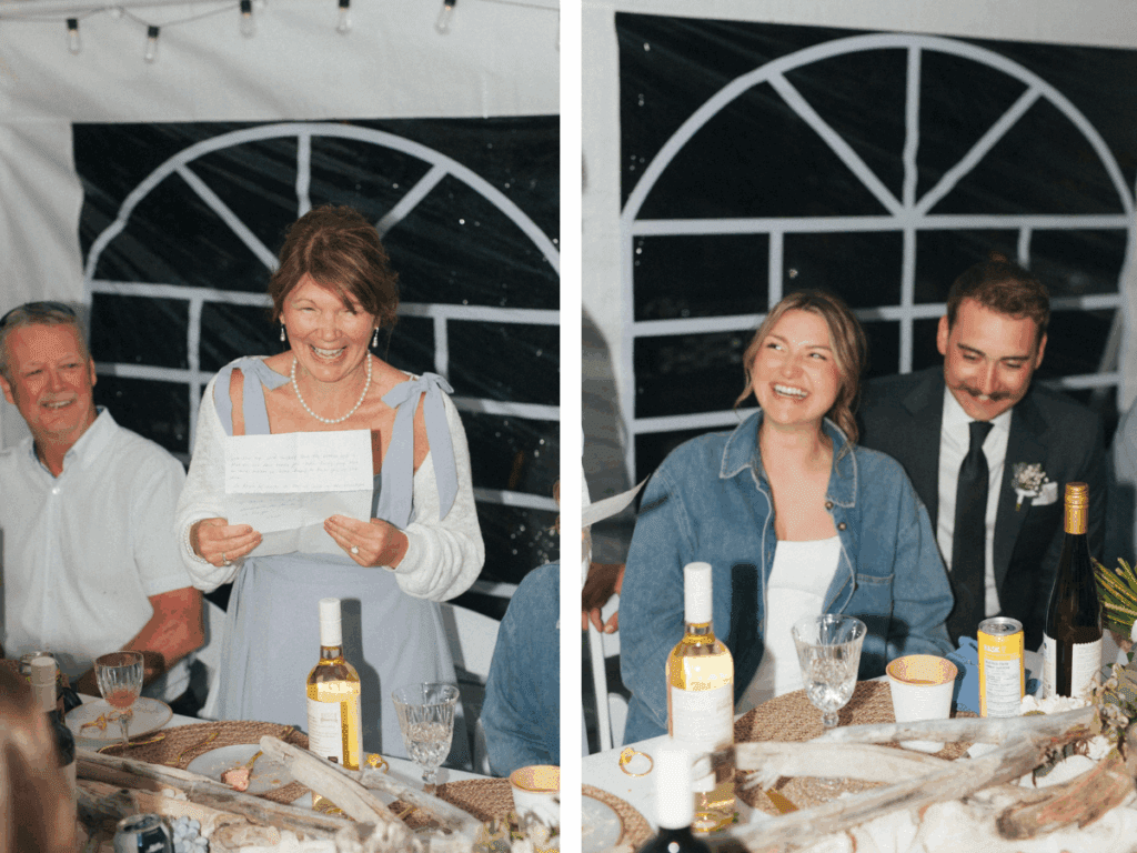 bride and groom laugh at dinner table in tent