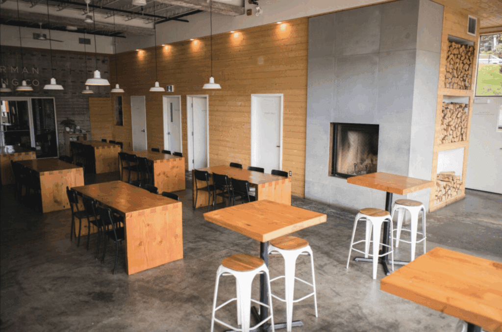 modern industrial brewery with concrete and wood walls