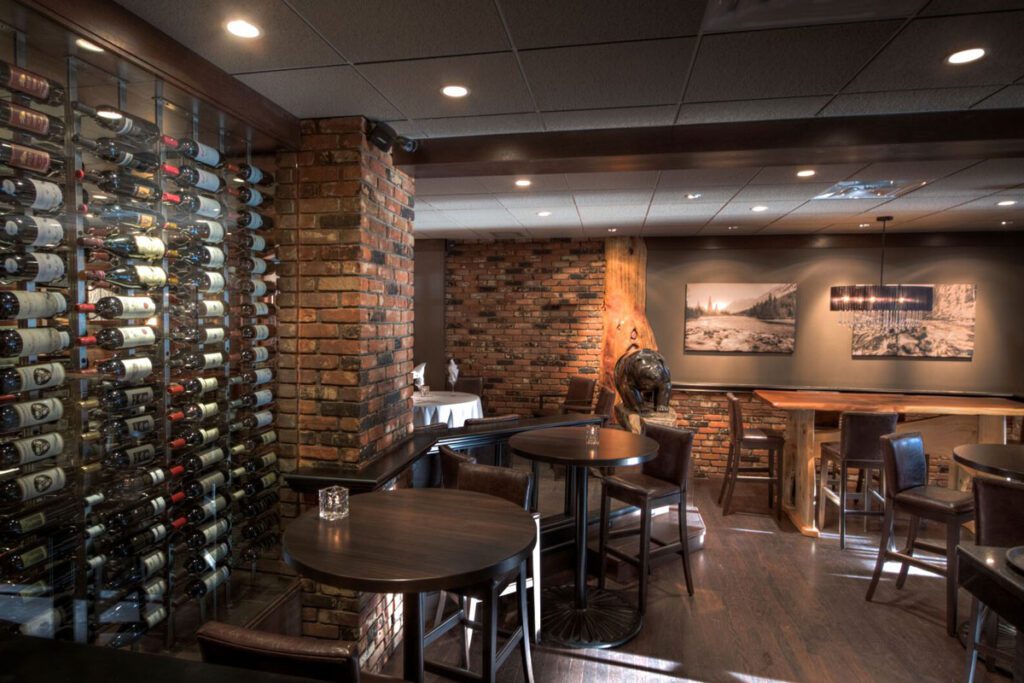 a dark, modern restaurant in Revelstoke, BC