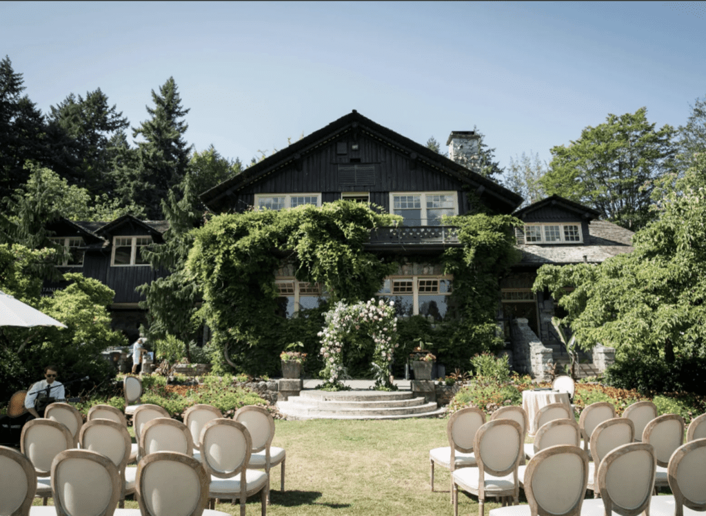 the lawn of the Stanley Park Pavillion in Vancouver set up for a wedding