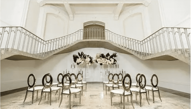 modern white pavillion in the Vancouver Art Gallery set up for a wedding